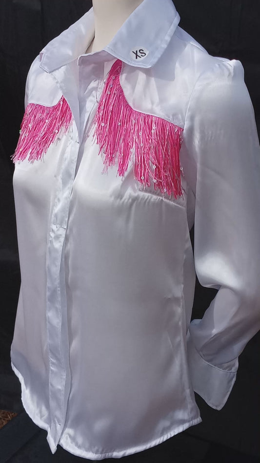 This video shows a 360 view of my handmade white with pink sparkly fringe western shirt. It highlights the way the light reflects off of satin fabric as well as the pink sparkly fringe accent. My customers have the option of buttons or pearl snaps. My shirts are available in sizes XS-5XL.  C Boondocks Treasures Boutique 2025